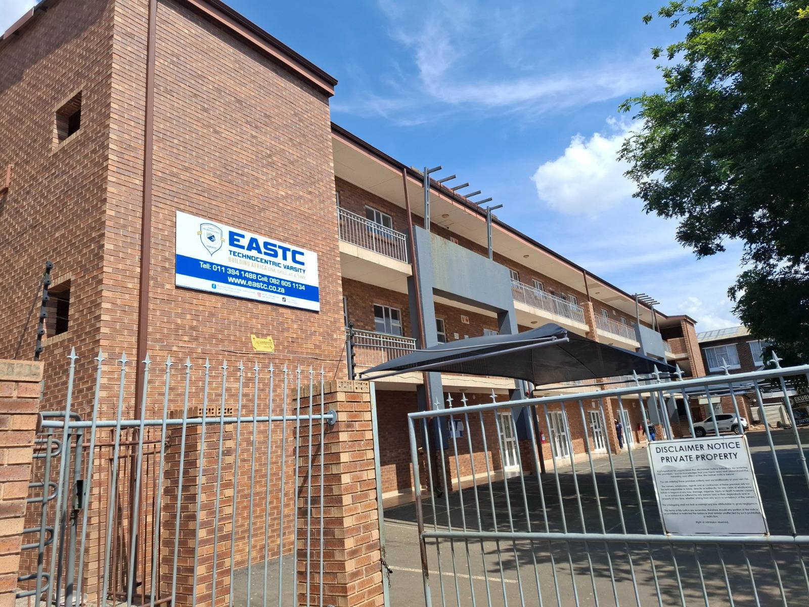 Institute (#NATED) building — EASTC brick campus building